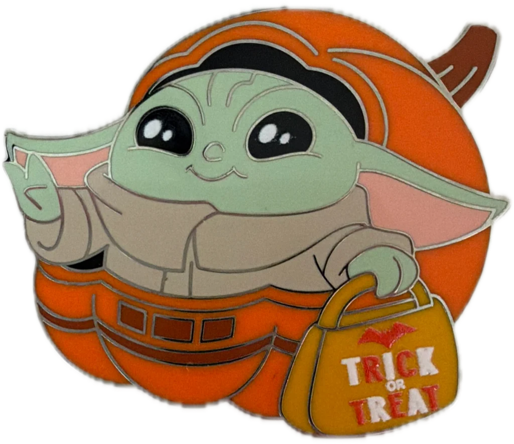 Pixie Dust Press's Grogu holding candy-filled pumpkin pin